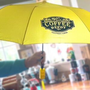 Mister Chris' Collector Daisy Yellow Umbrella. This special Collector Daisy Yellow Umbrella will have you singing in the rain with a pep in your step as you make your way to your destination.
